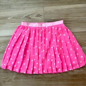 Pink polka-dot skirt with pleated design